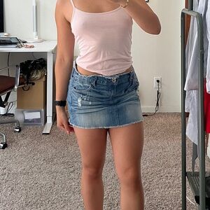 2000s distressed denim jean mini skirt.